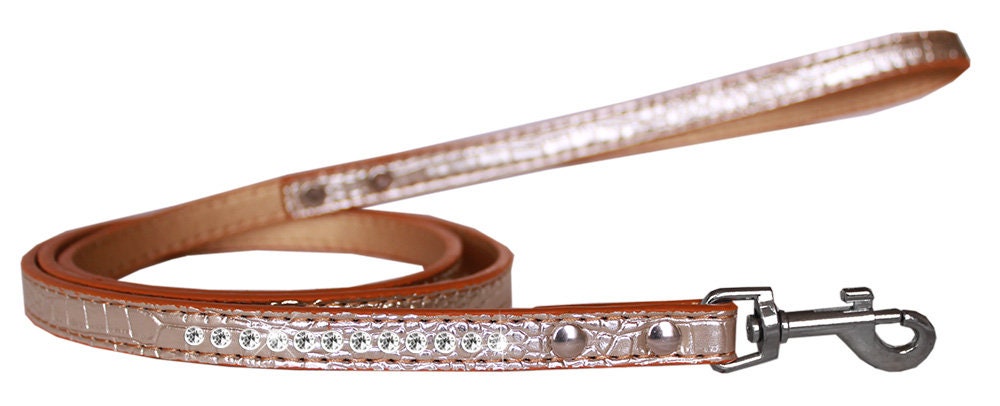A stylish dog leash made of faux croc material with a row of clear crystals, perfect for pets.