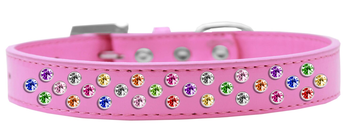Stylish dog collar with three rows of sparkling crystals on faux leather, available in various colors and sizes.