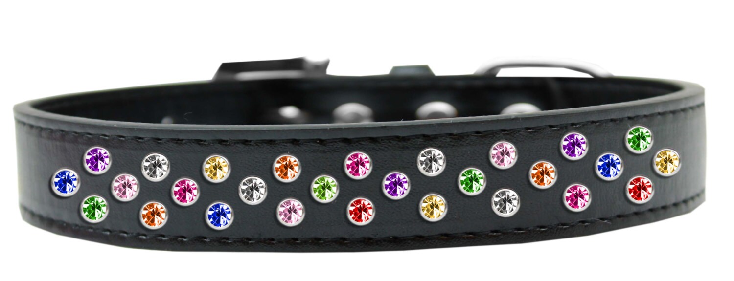 Stylish dog collar with three rows of sparkling crystals on faux leather, available in various colors and sizes.