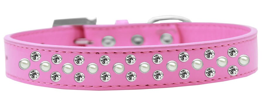 Elegant dog collar featuring pearl and clear crystal rimsets, designed for pets with a stylish faux leather finish.