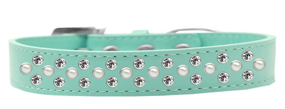 Elegant dog collar featuring pearl and clear crystal rimsets, designed for pets with a stylish faux leather finish.