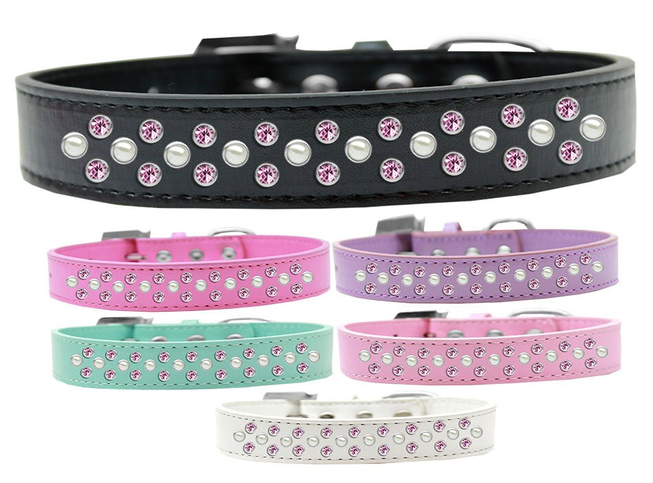 Elegant dog collar featuring pearl and light pink crystals, designed for stylish pets.