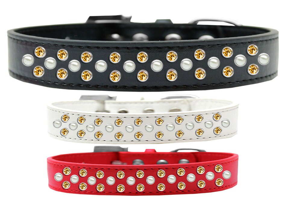 Elegant dog collar featuring pearl and yellow crystal rimsets, designed for stylish pets.