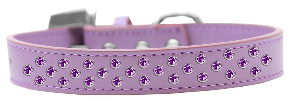 Purple faux leather dog collar adorned with three rows of sparkling crystals, designed for stylish pets.