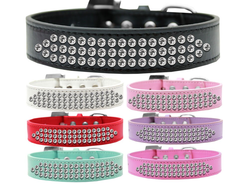 Elegant dog collar featuring three rows of clear crystals on soft faux leather, perfect for stylish pets.