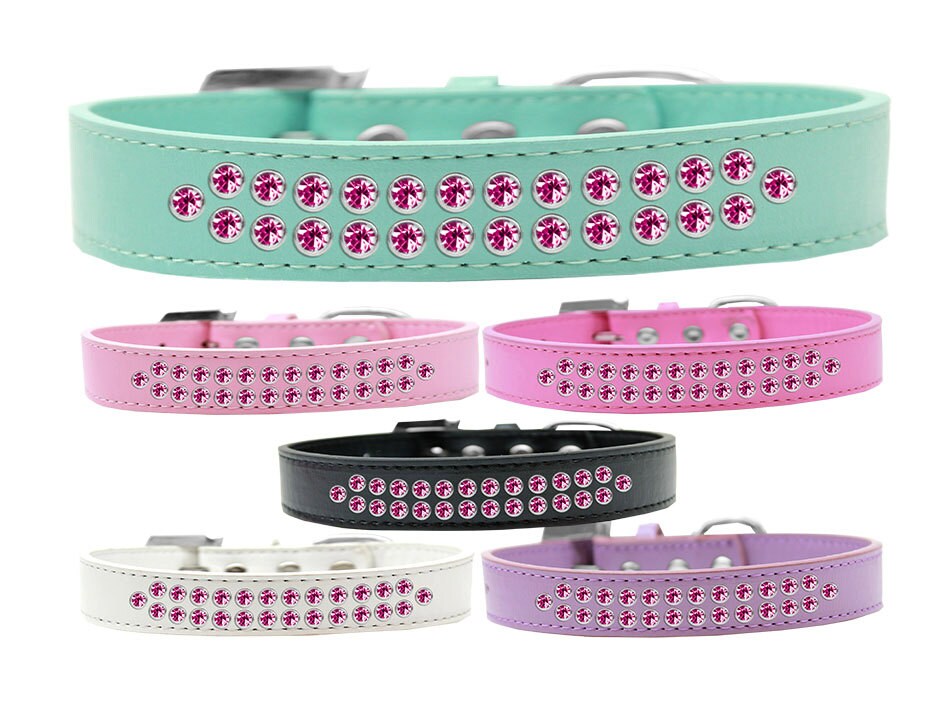 Bright pink crystal dog collar made of faux leather, featuring two rows of sparkling crystals and a crystal buckle.