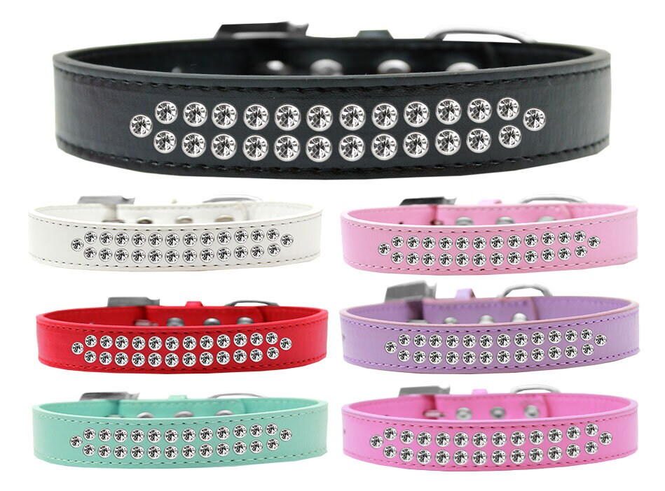 Stylish dog collar with two rows of clear crystals on faux leather, available in various colors and sizes.
