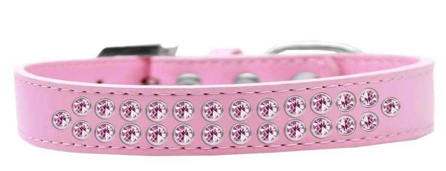 Light pink dog collar with two rows of crystal rimsets, featuring a crystal buckle and faux leather material.