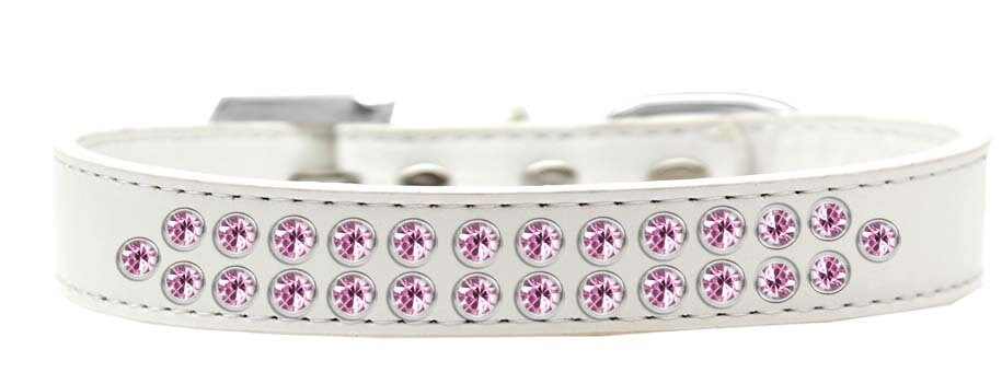 Light pink dog collar with two rows of crystal rimsets, featuring a crystal buckle and faux leather material.