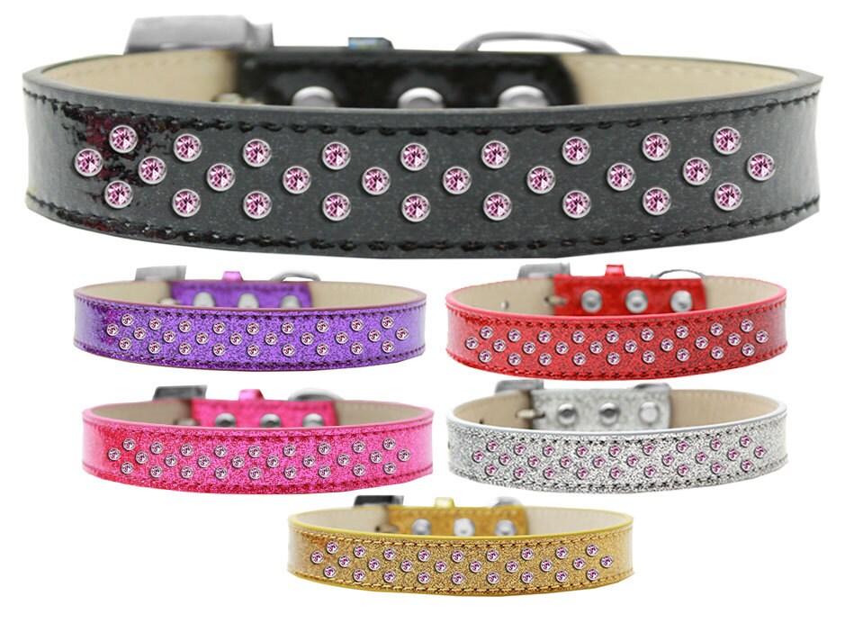 Light pink leather dog collar adorned with three rows of sparkling crystals, designed for pets.