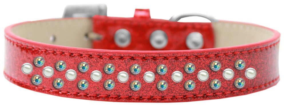 A stylish dog collar adorned with pearl and Aurora Borealis crystals, featuring three rows of sparkling stones on a soft glittery background.