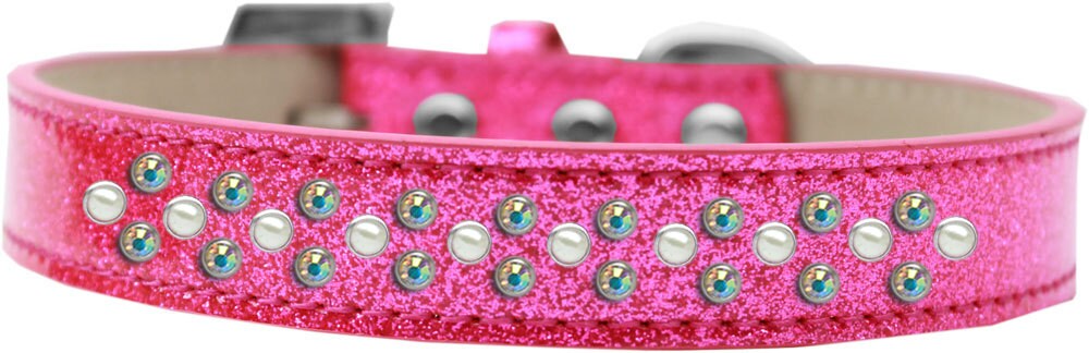 A stylish dog collar adorned with pearl and Aurora Borealis crystals, featuring three rows of sparkling stones on a soft glittery background.