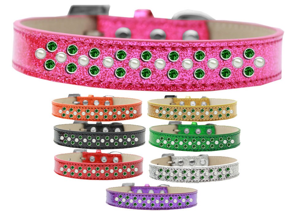 A luxurious dog collar adorned with pearl and emerald green crystals, featuring three sparkling rows and a soft glittery finish.