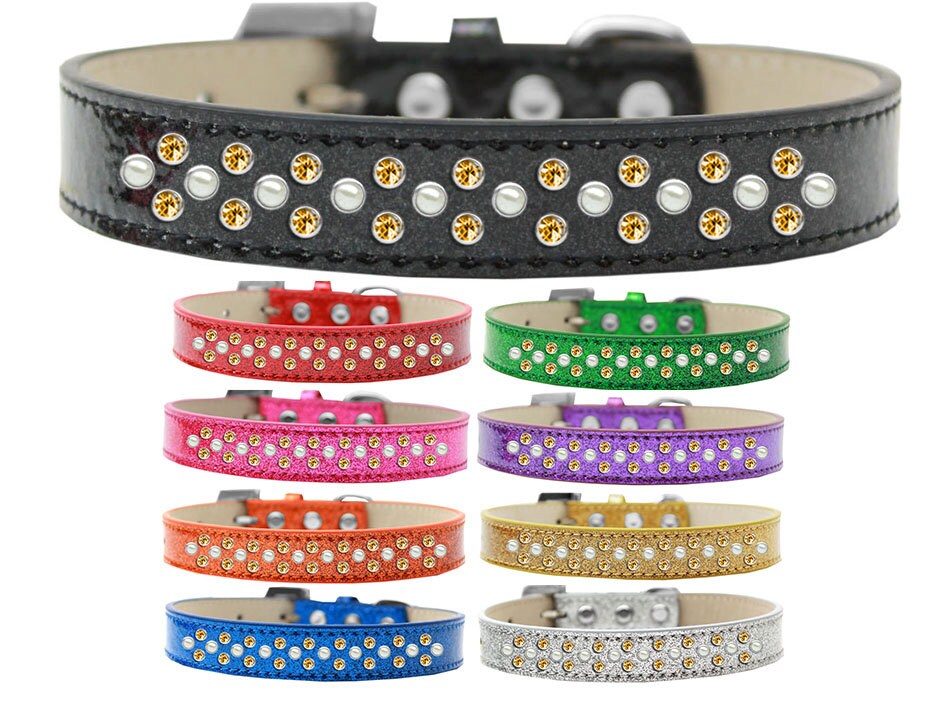 Elegant dog collar featuring pearl and yellow crystal rimsets, designed for pets with a soft and glittery finish.
