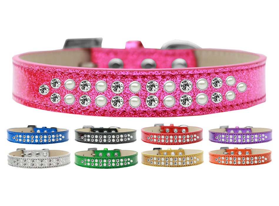 A stylish dog collar featuring two rows of alternating pearl and clear crystal stones, made from soft leather, perfect for pets.