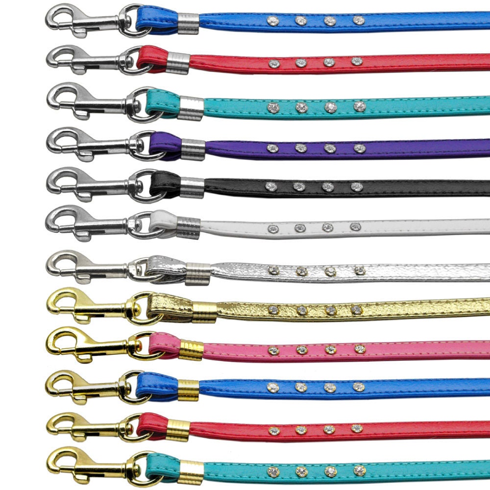 A stylish dog leash featuring clear crystal rhinestones with gold and silver hardware options, perfect for pets.