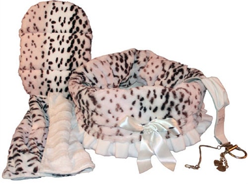 Reversible Snuggle Bugs Pet Bed in Snow Leopard design, showcasing its luxurious fabric and cozy interior, perfect for small pets.