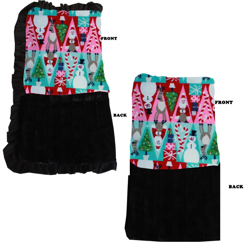 A cozy Christmas Medley Cuddle Blanket made from soft minky fabric, perfect for pets and people to snuggle under during the holiday season.