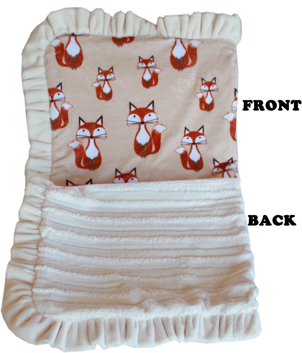 Foxy Cuddle Blanket for pets, made of soft faux fur, available in various sizes, perfect for cuddling and sleeping.