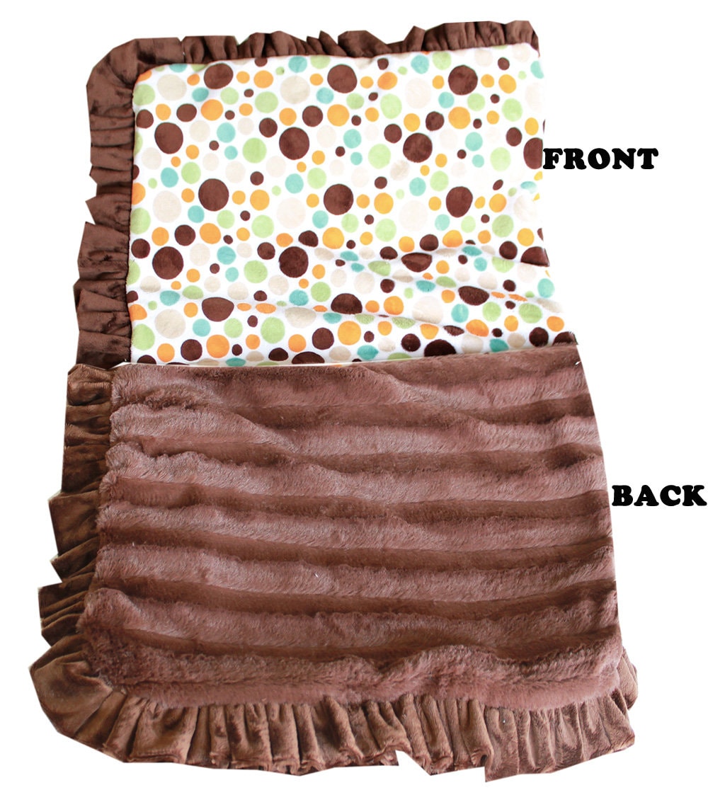 A cozy Dog, Puppy & Cat Sleepytime Cuddle Blanket in vibrant Party Dots design, showcasing Aqua, Pink, and Fall Dots patterns.