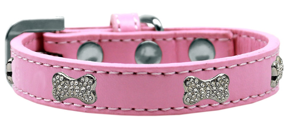 Premium dog collar featuring clear crystal bone accents, designed for style and durability.