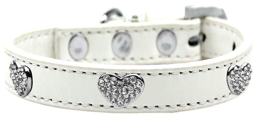 Premium dog collar featuring clear crystal hearts, available in various sizes for stylish pets.