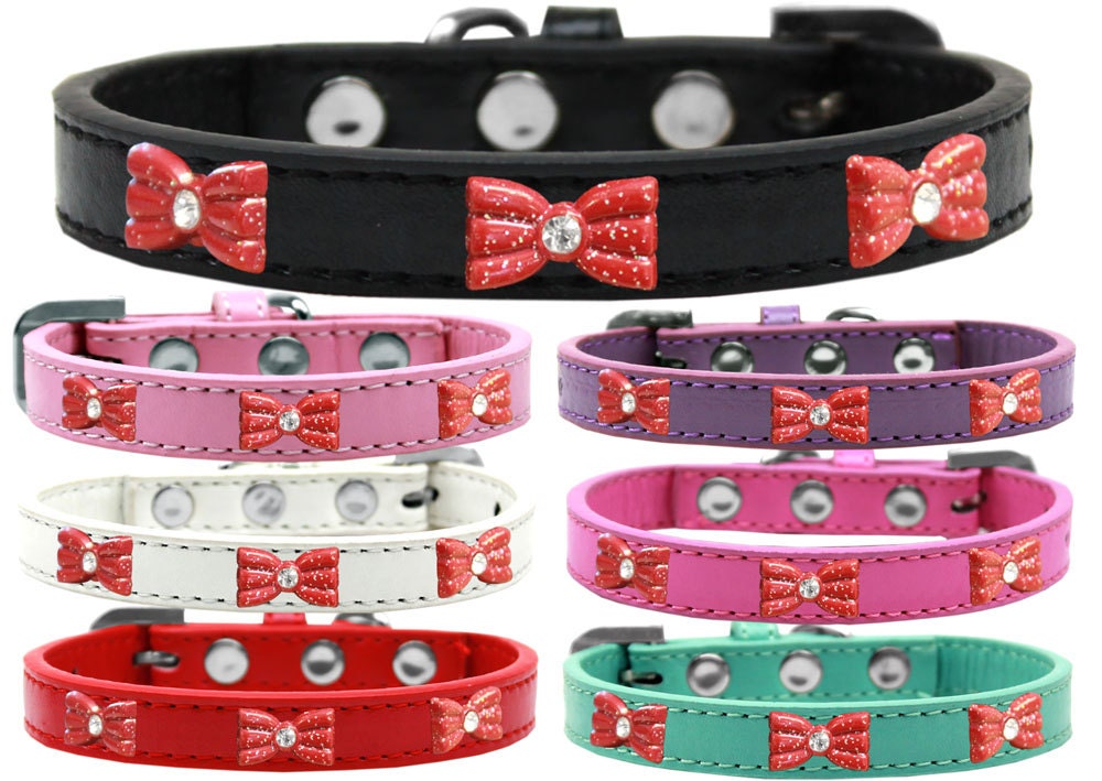 A stylish red glitter bow collar for dogs, featuring secure metal widgets and a vibrant design, perfect for fashionable pets.