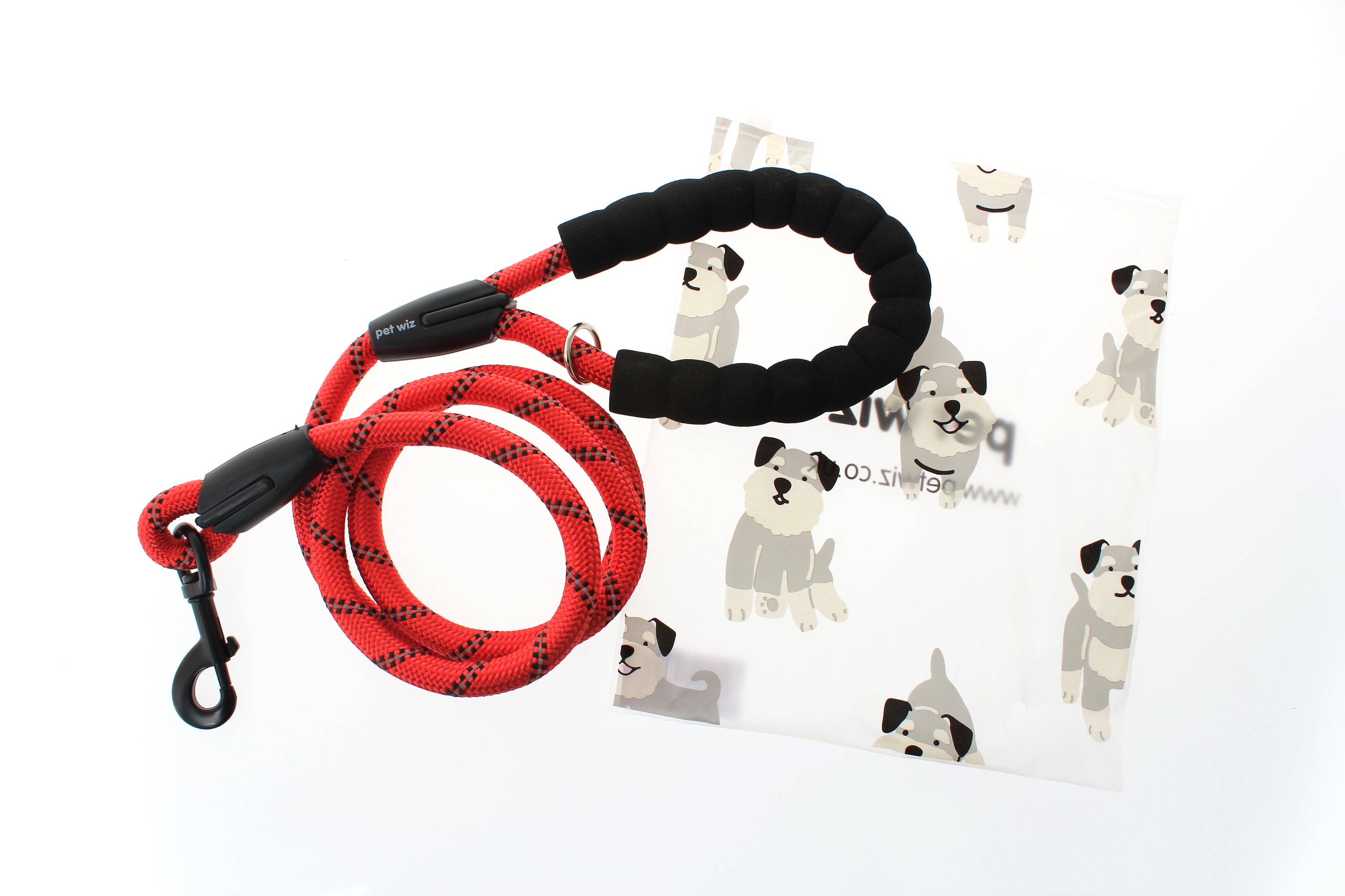 A durable dog rope lead featuring reflective stitching and a comfortable padded handle, ideal for safe nighttime walks.