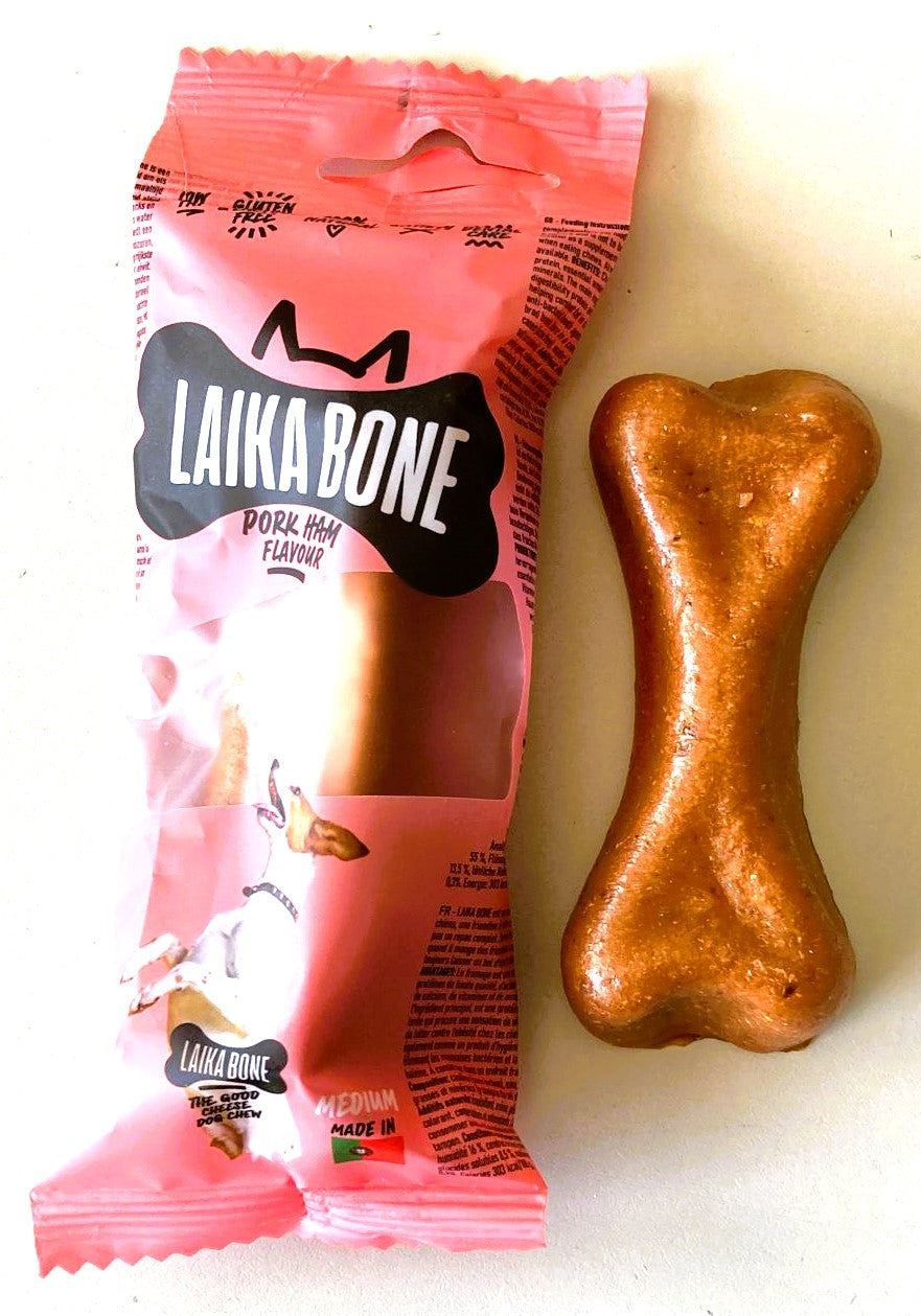 A box of Dog Treats Cheese & Ham/Bacon Chew, featuring natural ingredients and a delicious flavor for dogs.