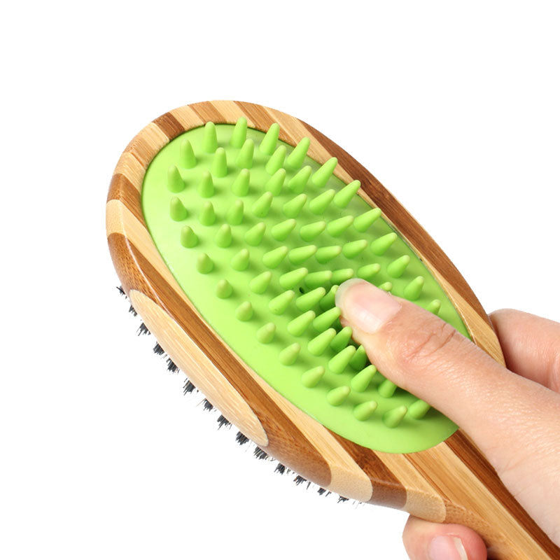 Double sided bamboo dog brush featuring silicone massager and boar bristles, ideal for grooming all dog breeds.