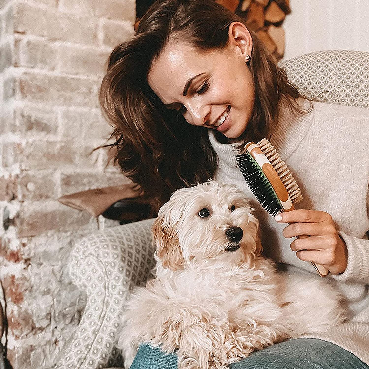 Double sided bamboo dog brush featuring pin and bristle sides for effective grooming.