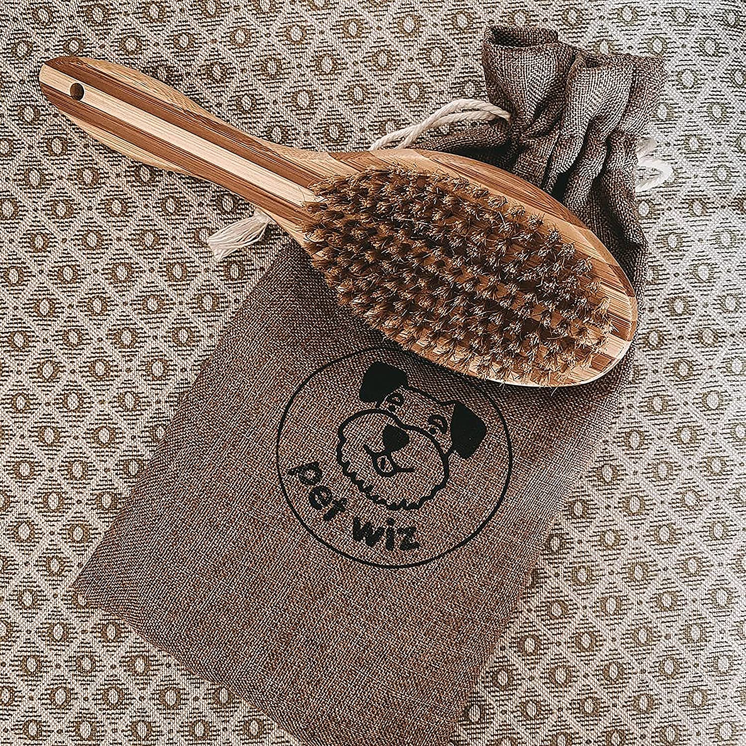 Double sided bamboo dog brush featuring pin and bristle sides for effective grooming.