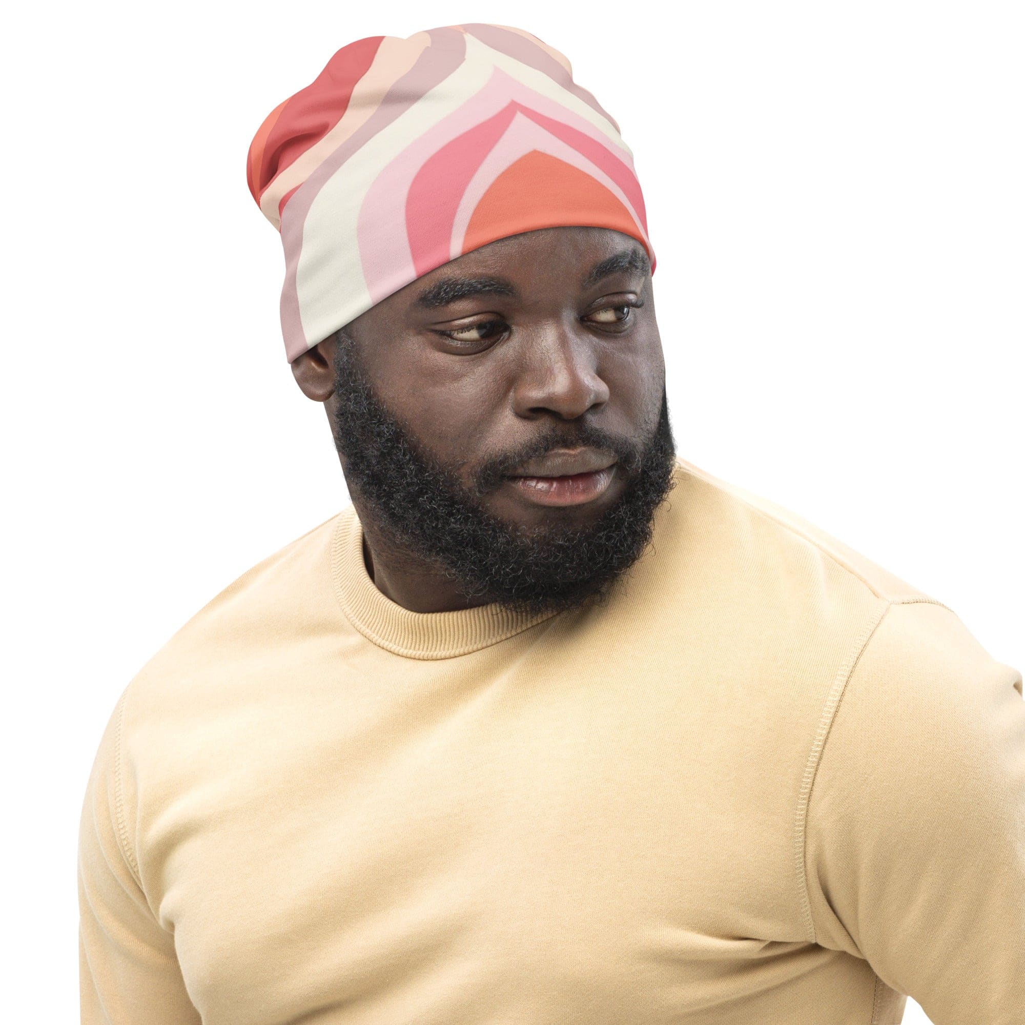 Double-layered beanie hat in pink and white with boho swirl lines pattern, showcasing its stylish and contemporary design.