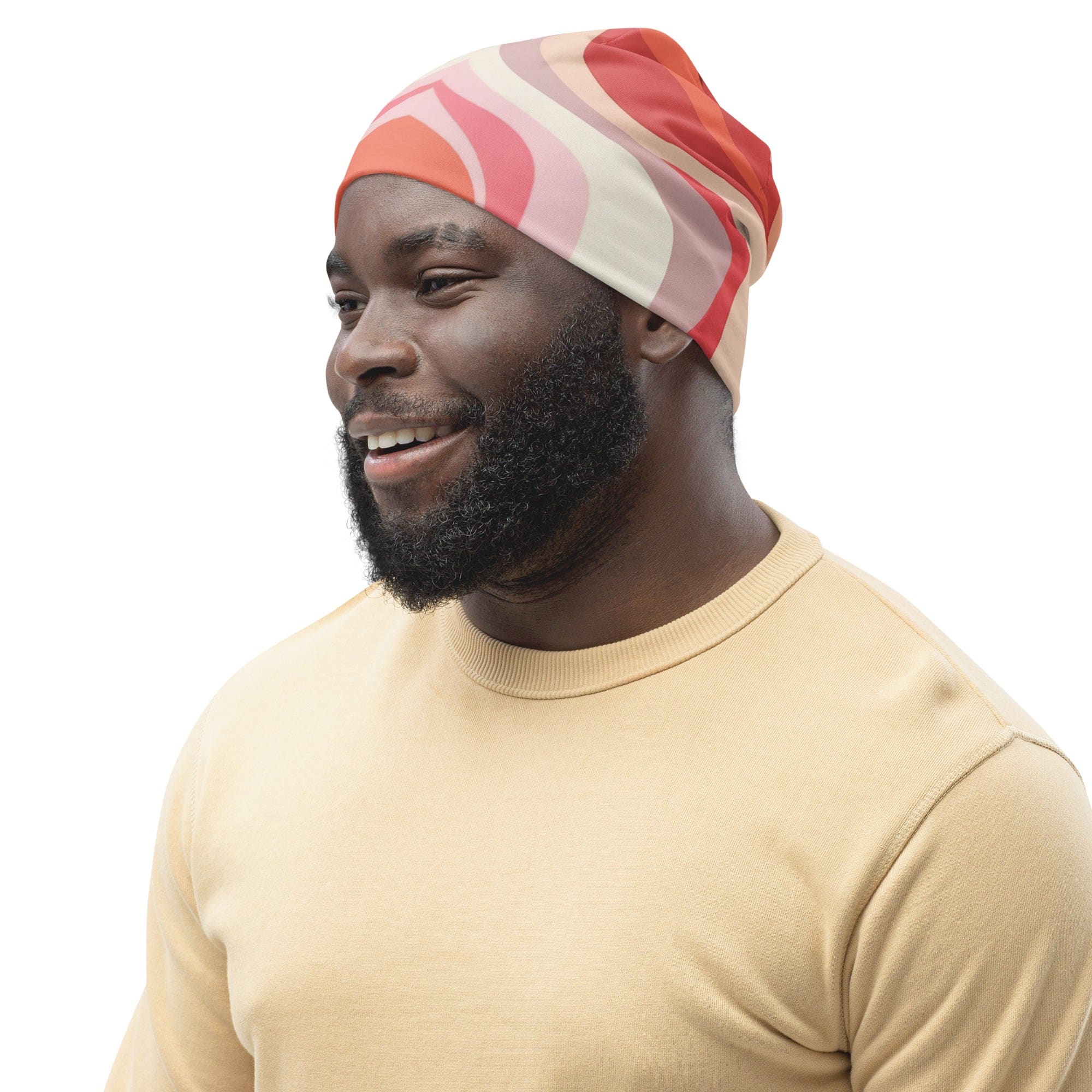 Double-layered beanie hat in pink and white with boho swirl lines pattern, showcasing its stylish and contemporary design.