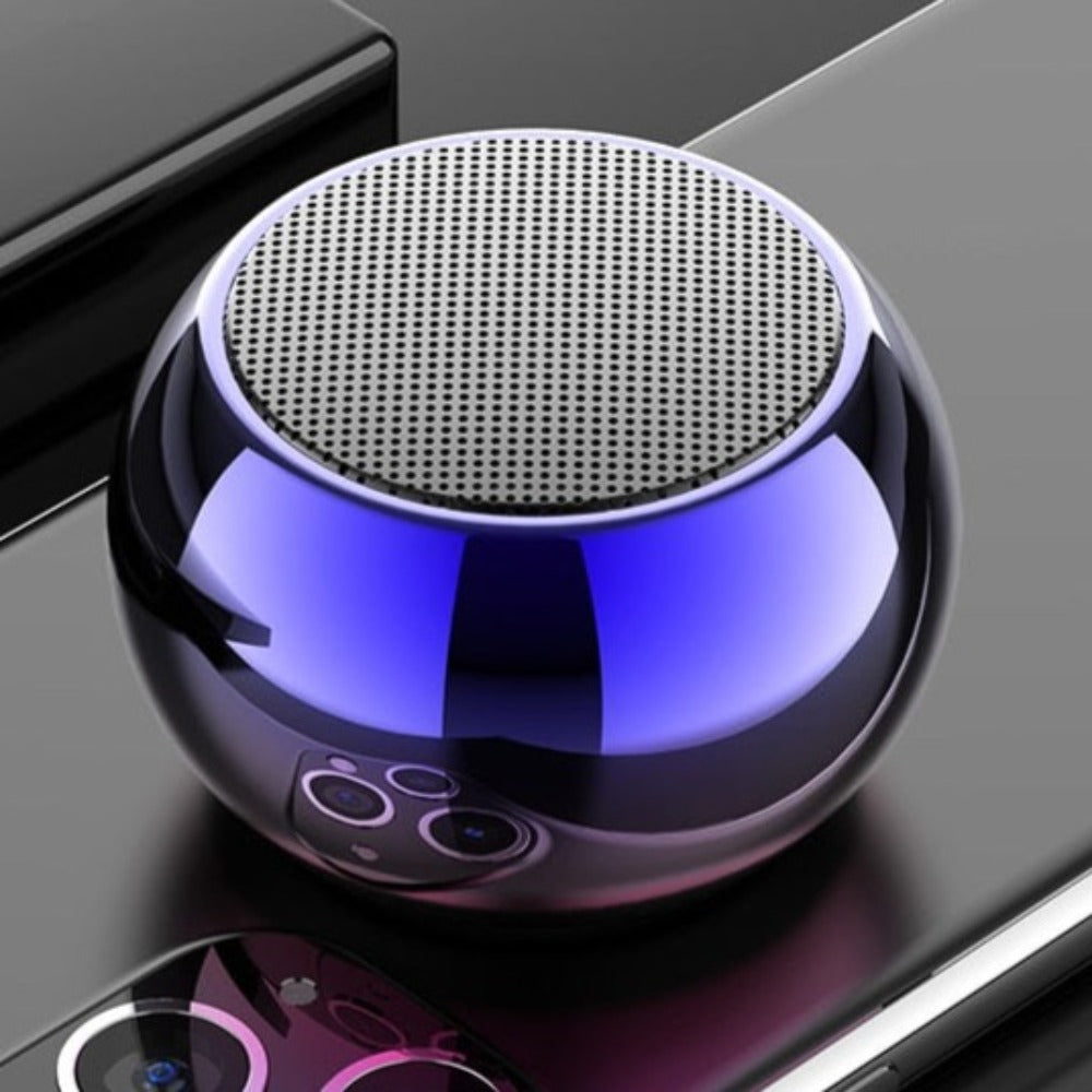 Dragon Mini True Wireless Bluetooth Speaker in a compact size, showcasing its sleek design and portability.