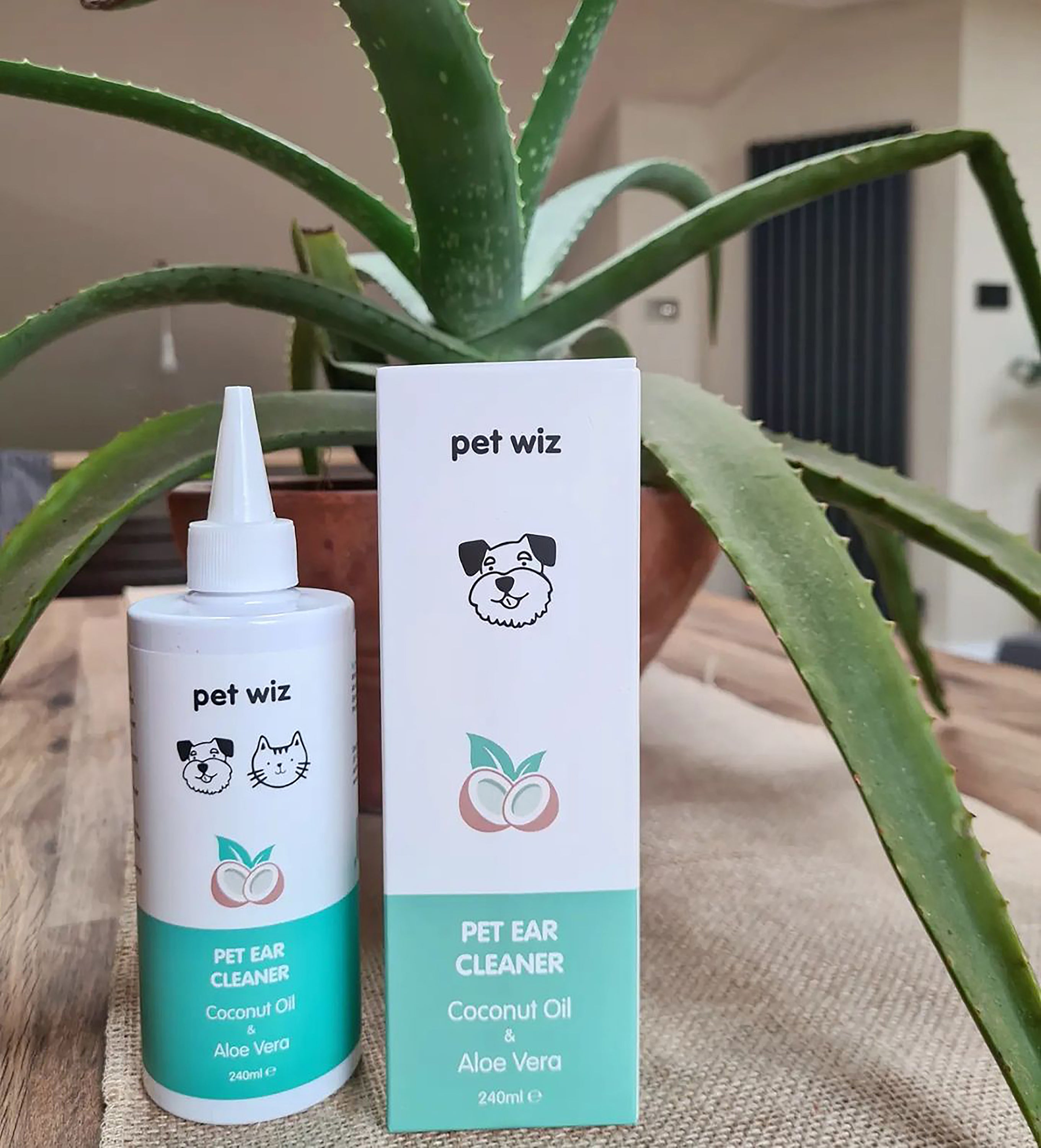 Pet Wiz Ear Cleaner for Dogs and Cats with coconut oil and aloe vera, designed for safe and gentle ear cleaning.