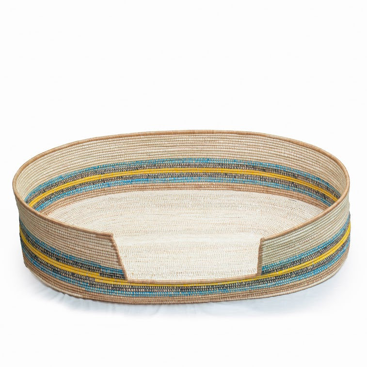Eco-Friendly Fair Trade Pet Bed, handcrafted from natural materials with vibrant colors, showcasing authentic African craftsmanship.