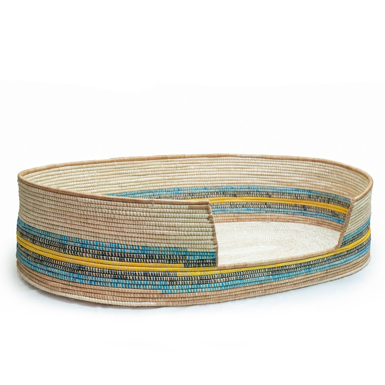Eco-Friendly Fair Trade Pet Bed, handcrafted from natural materials with vibrant colors, showcasing authentic African craftsmanship.