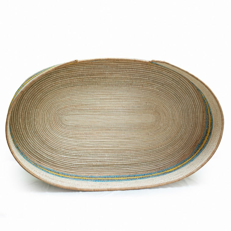 Eco-Friendly Fair Trade Pet Bed, handcrafted from natural materials with vibrant colors, showcasing authentic African craftsmanship.