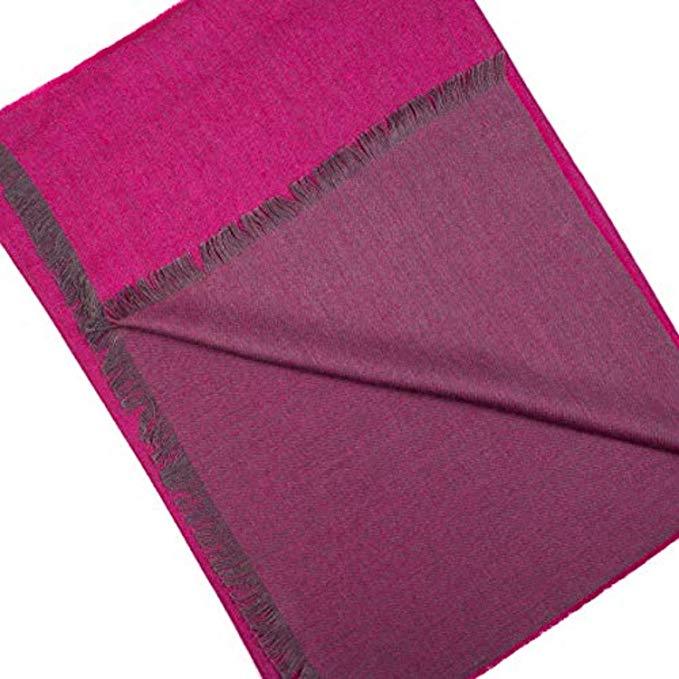 Elegant fuchsia shawl made of 70% baby alpaca and 30% silk, showcasing luxurious texture and vibrant color.