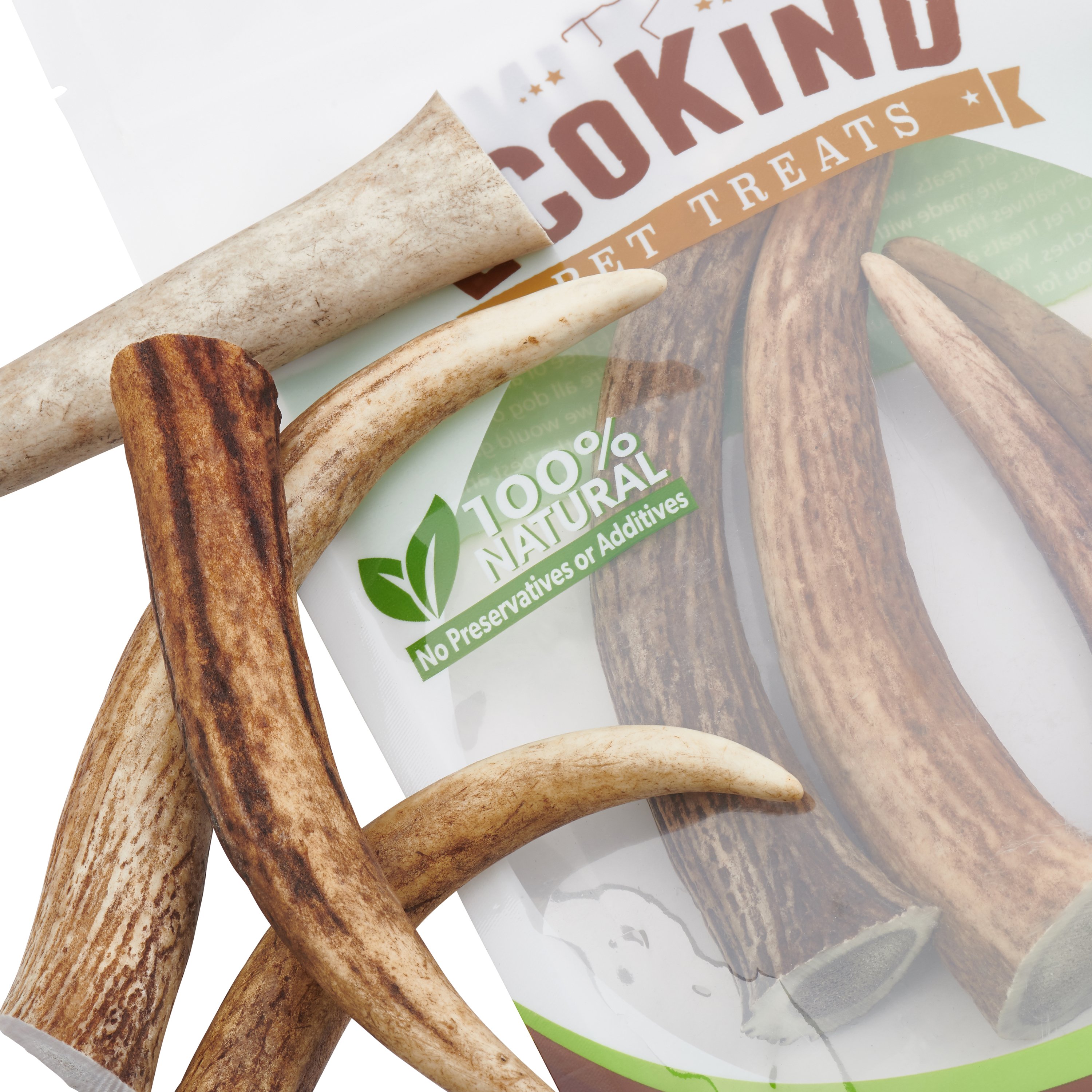 A selection of Elk Antler Tips Dog Chews, showcasing their natural texture and varying lengths, perfect for strong chewers.