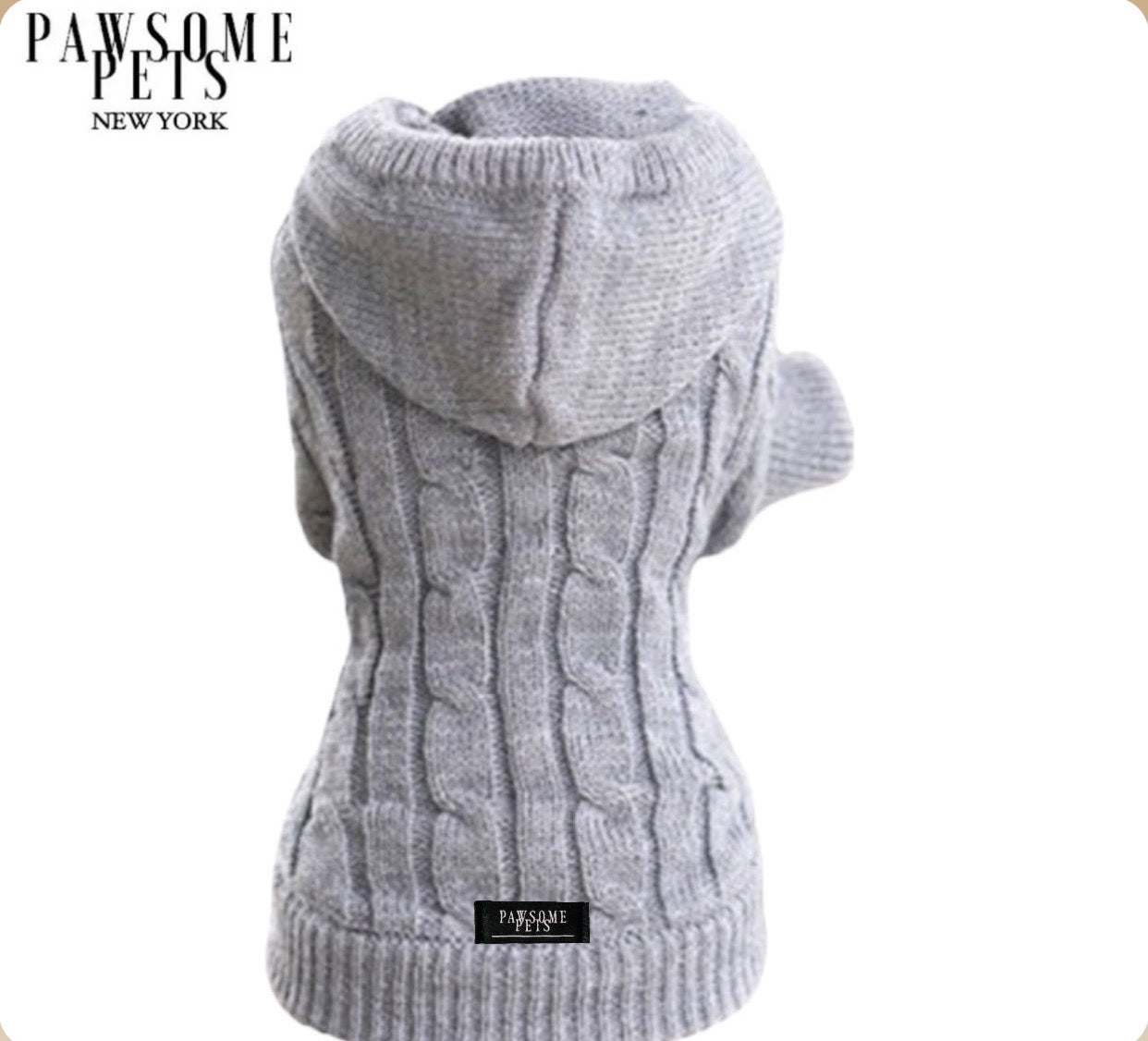 A grey cable knit sweater with a hat for dogs and cats, showcasing a soft and stretchy design perfect for cold weather.