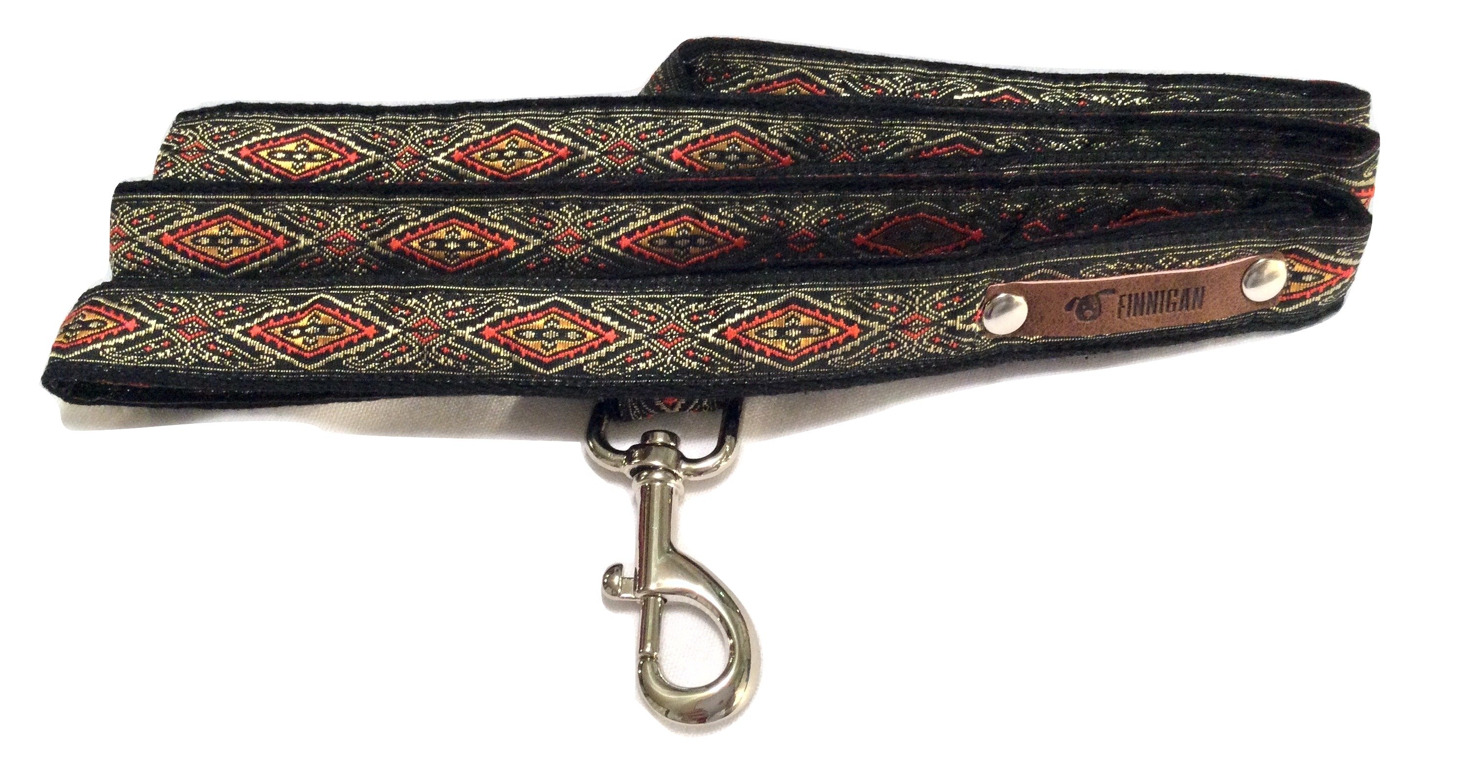 A stylish Finnigan's Personalised Designer Dog Collar featuring vibrant patterns and a custom engraved aluminium buckle, perfect for any dog.