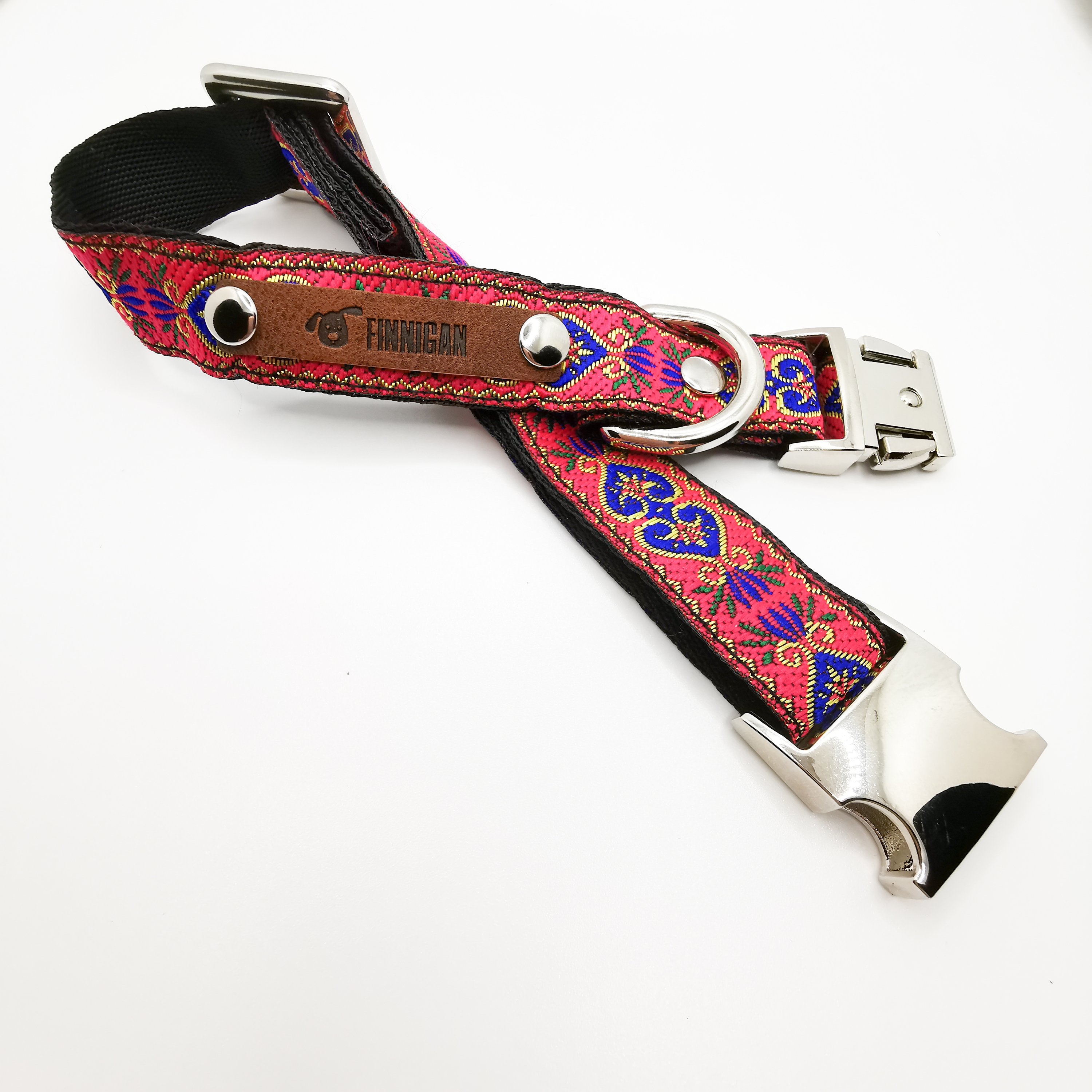 A stylish Finnigan's Personalised Designer Dog Collar featuring vibrant patterns and a custom engraved aluminium buckle, perfect for any dog.