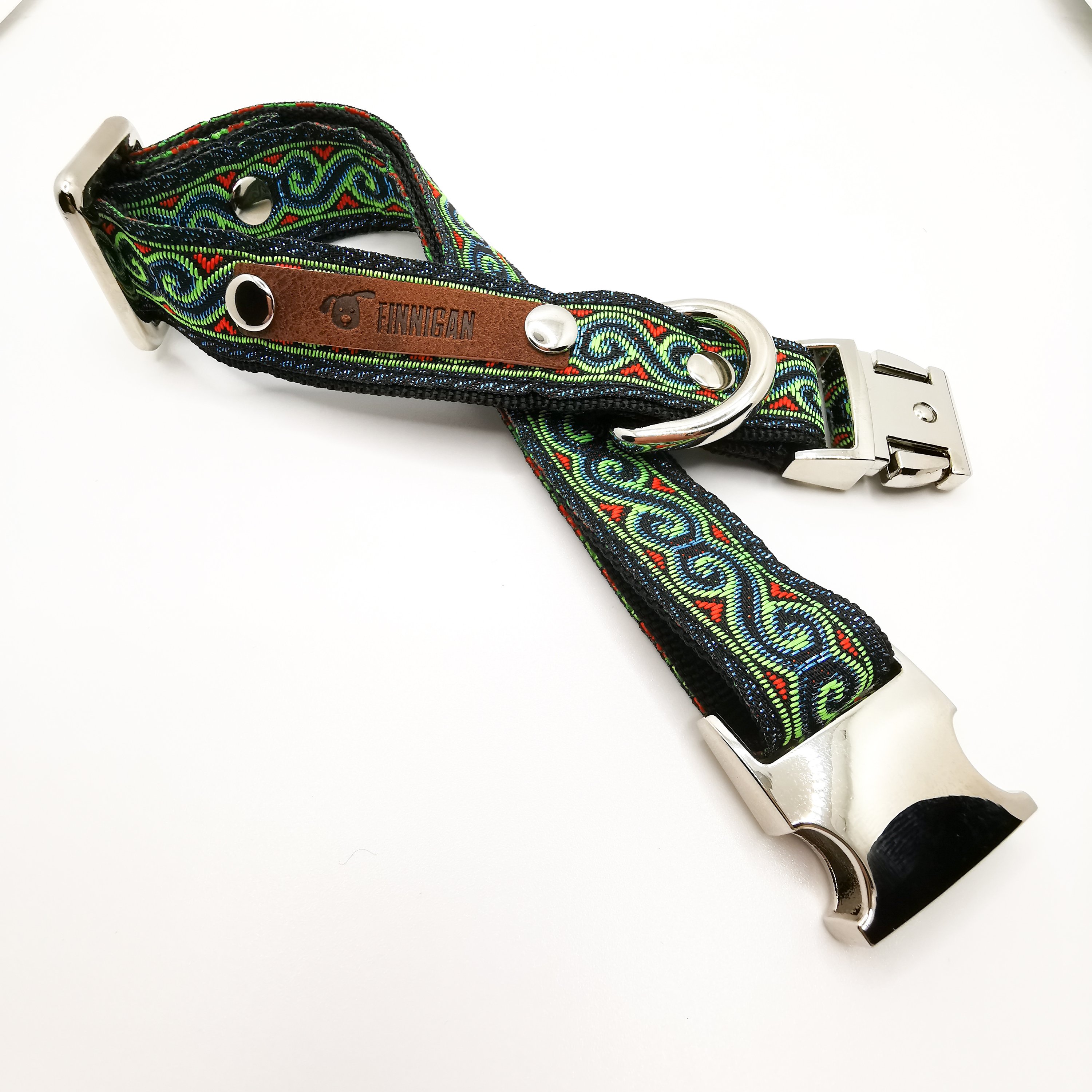 A stylish Finnigan's Personalised Designer Dog Collar featuring vibrant patterns and a custom engraved aluminium buckle, perfect for any dog.