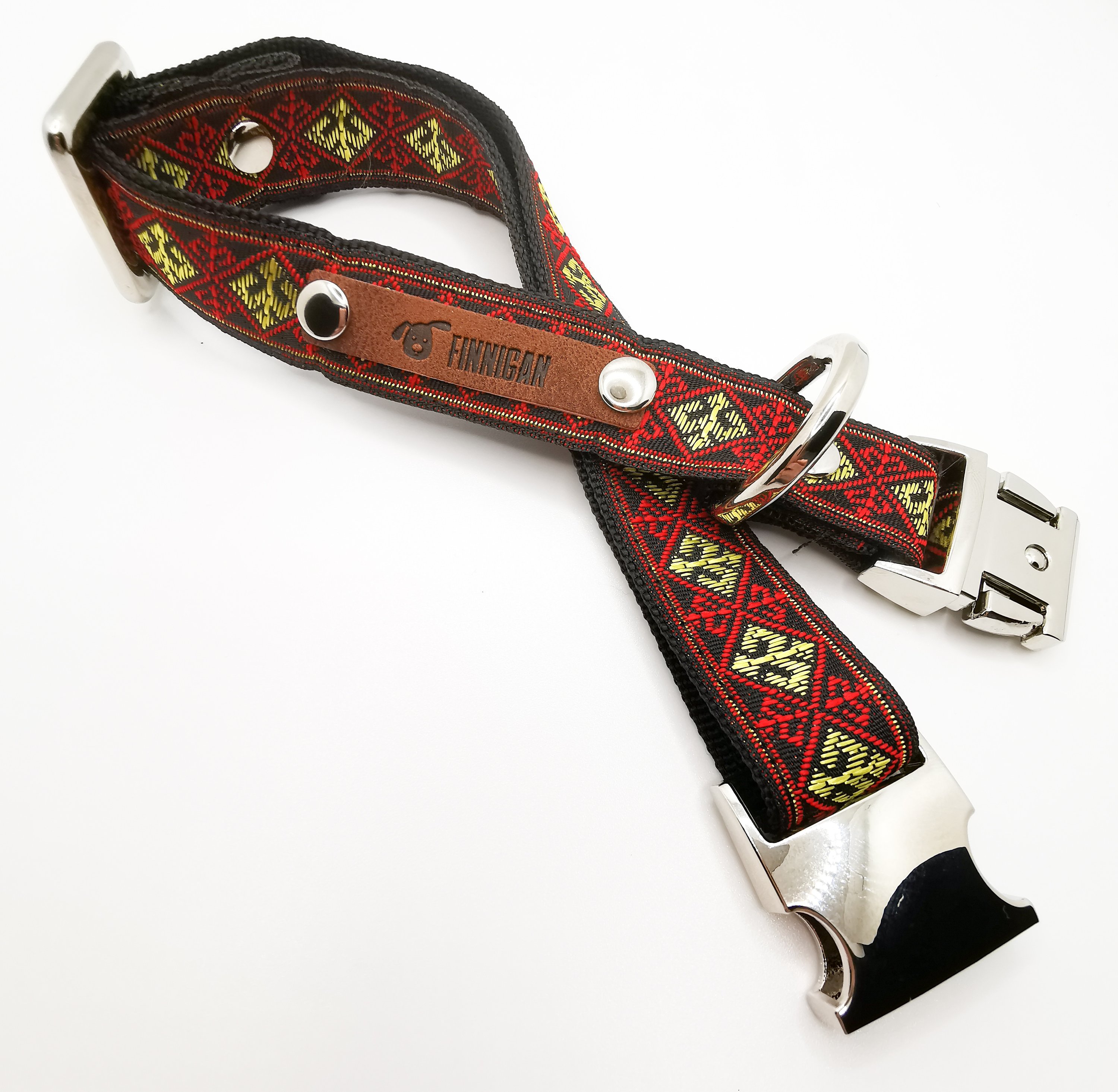 A stylish Finnigan's Personalised Designer Dog Collar featuring vibrant patterns and a custom engraved aluminium buckle, perfect for any dog.
