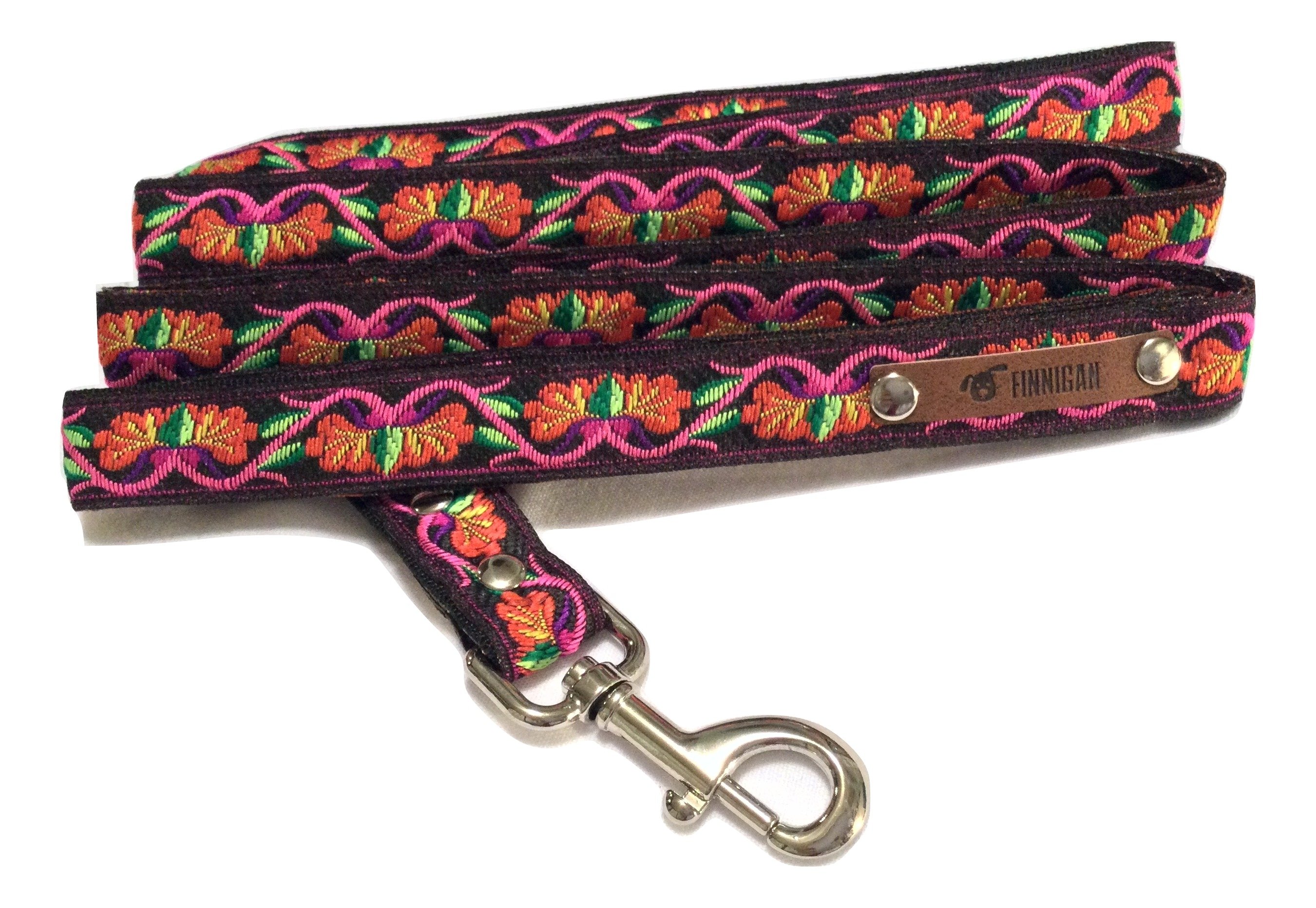 A stylish Finnigan's Personalised Designer Dog Collar featuring vibrant patterns and a custom engraved aluminium buckle, perfect for any dog.
