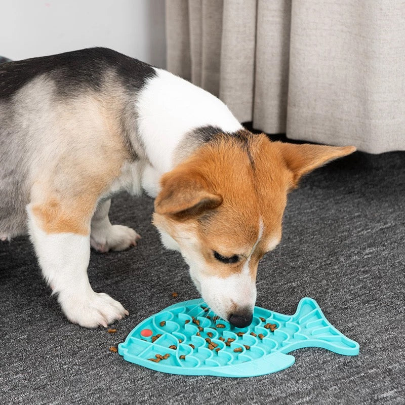 Fish shape silicone bowl designed for slow feeding and mental stimulation for small dogs and cats, featuring a no-slip base and rotating top.