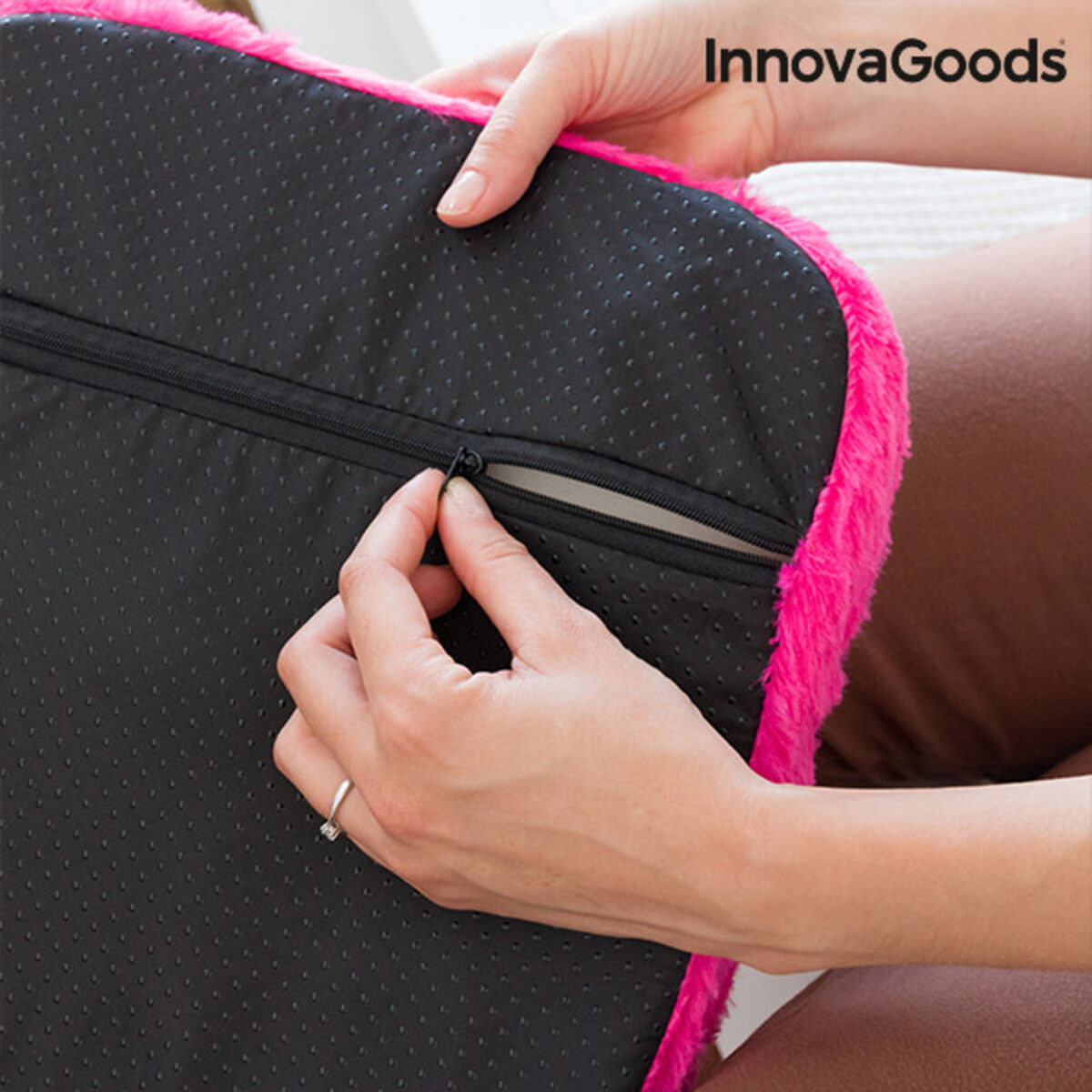 InnovaGoods Foot Massager in pink color, showcasing its ergonomic design and soft, velvety texture.