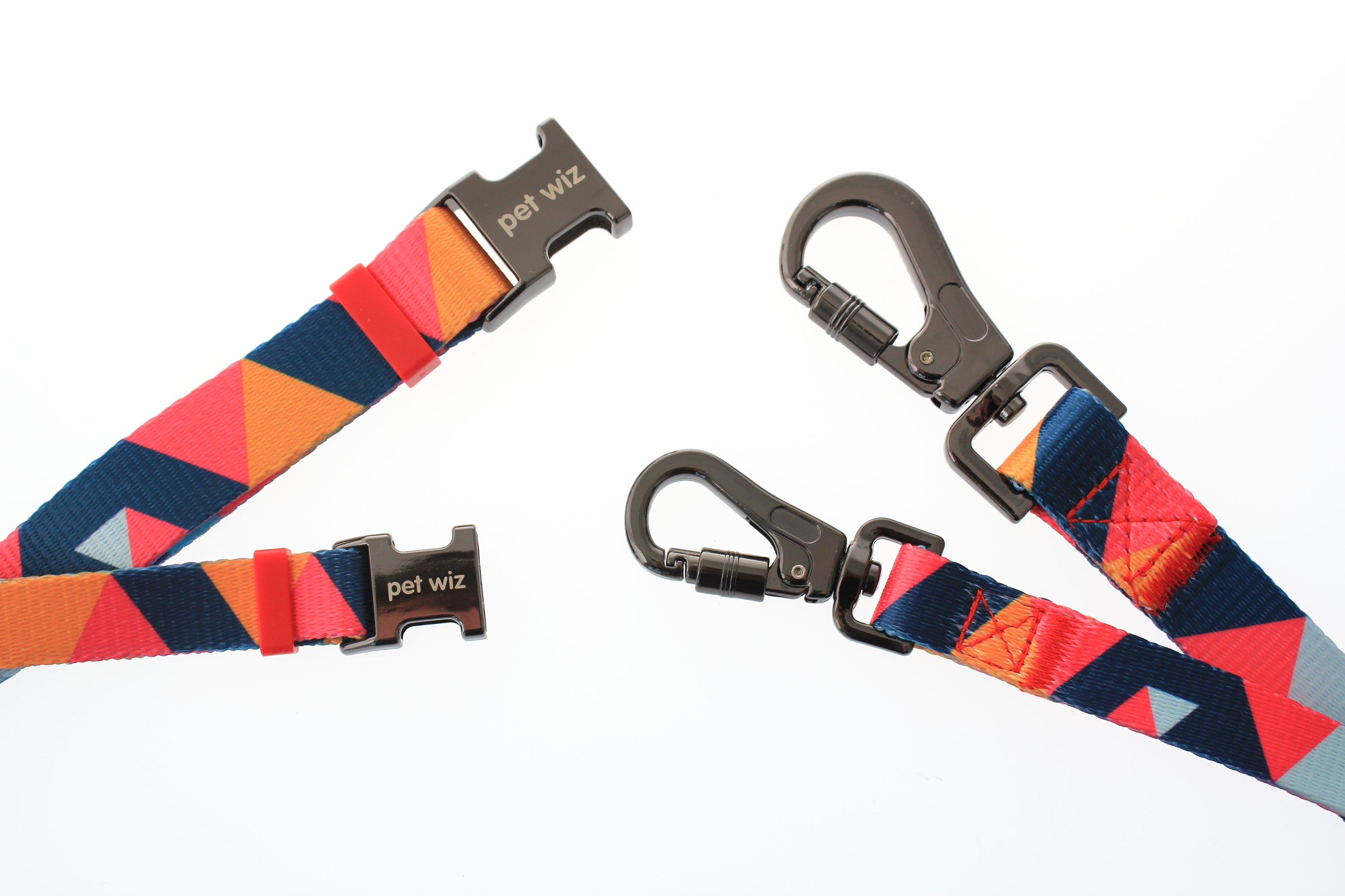 Stylish geometric collar, lead, and harness set for dogs in vibrant colors, showcasing premium materials and design.
